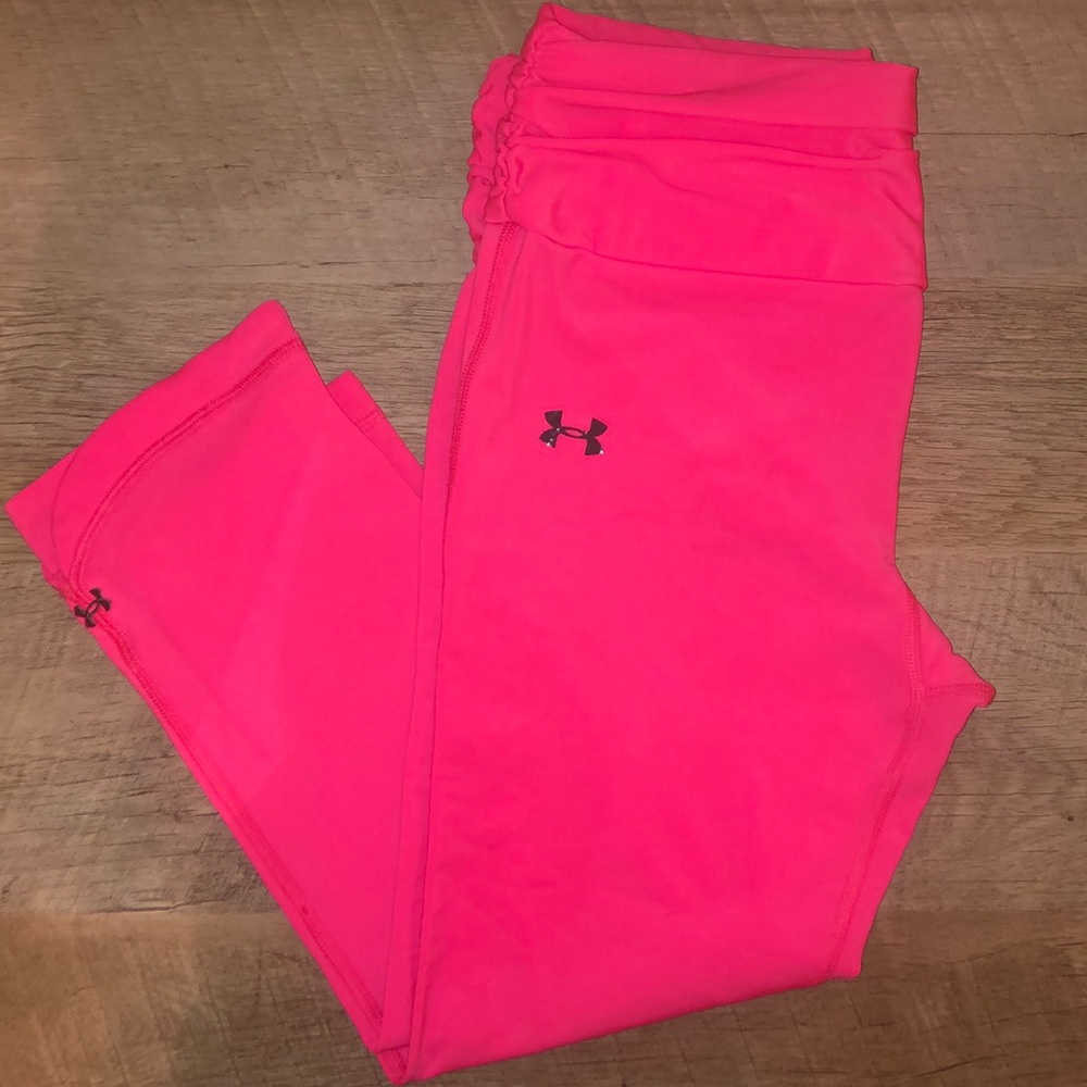 Under armour neon pink cropped workout leggings.